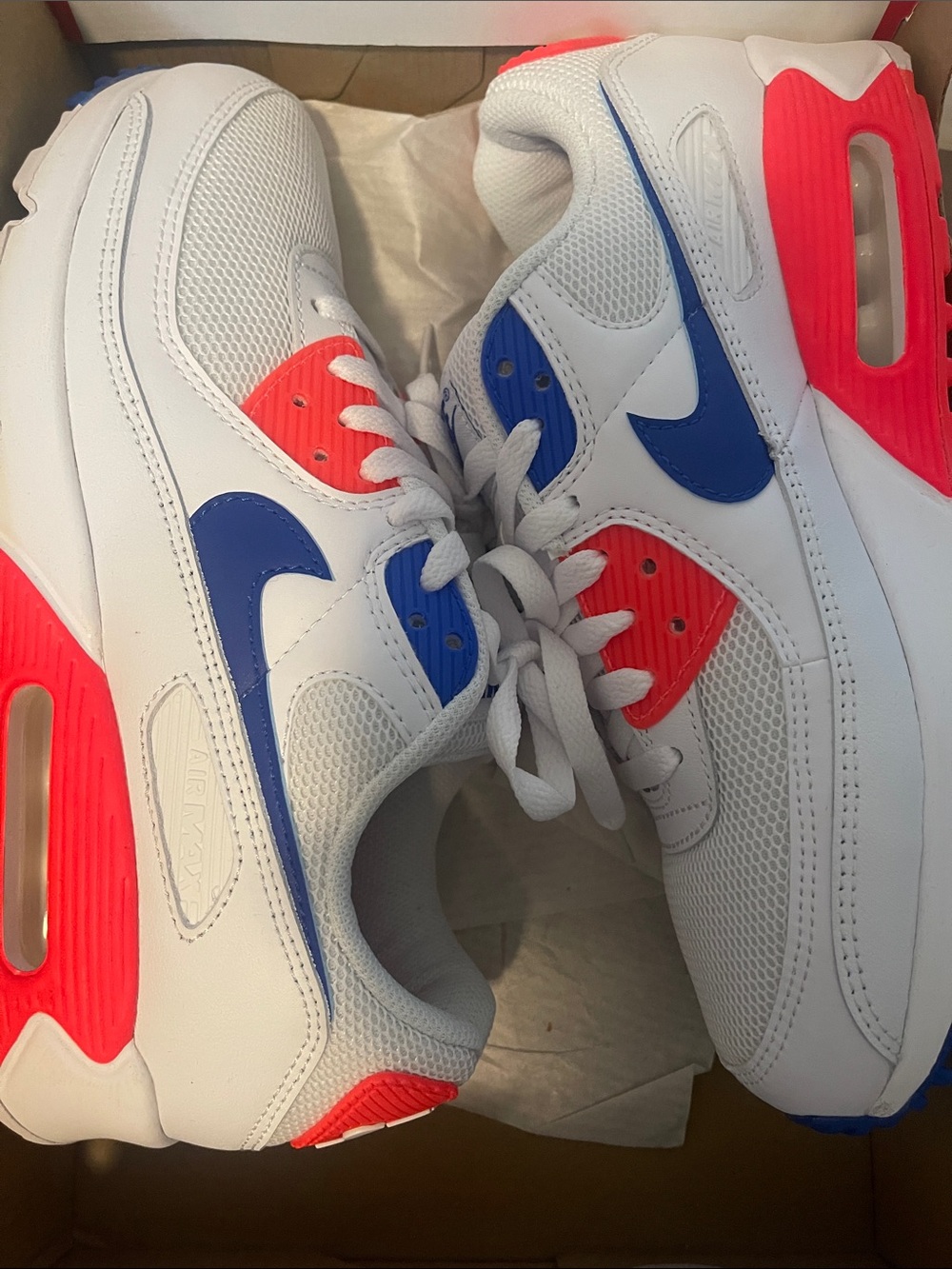 Nike Women's White Sneakers with Blue Swoosh and Neon Coral Accents